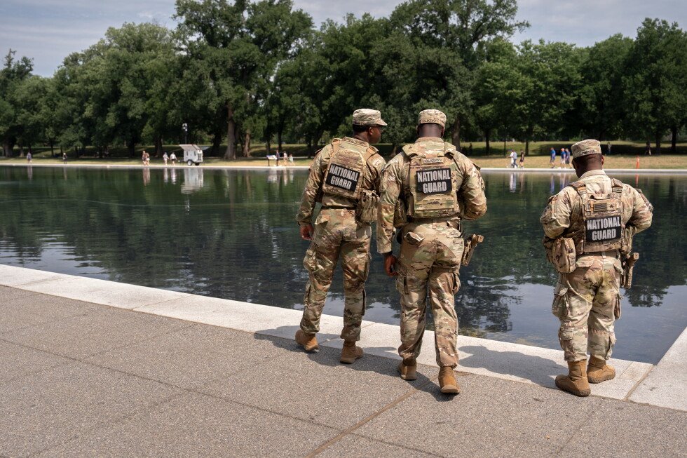 national-guard-and-us-park-police-patrol-reflecting-pool-as-coating-peels