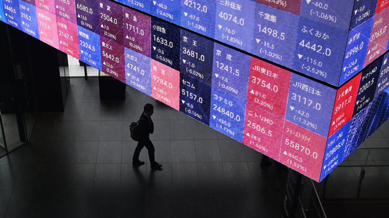 stocks-in-asia-tumble-as-ai.-uncertainty-jolts-tech-shares