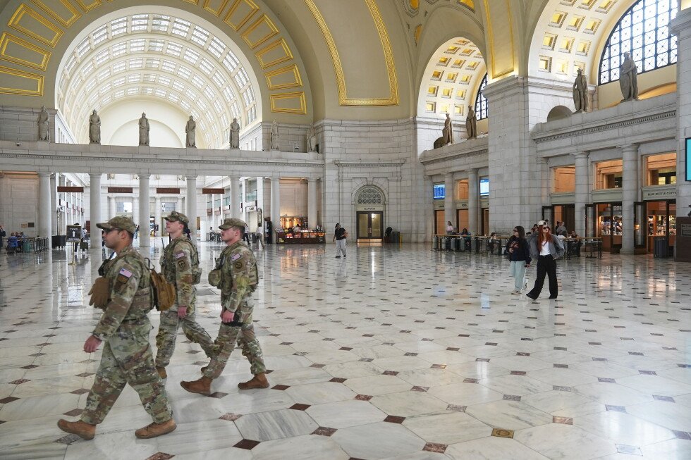 dc-settles-with-man-detained-protesting-troops-with-darth-vader-song