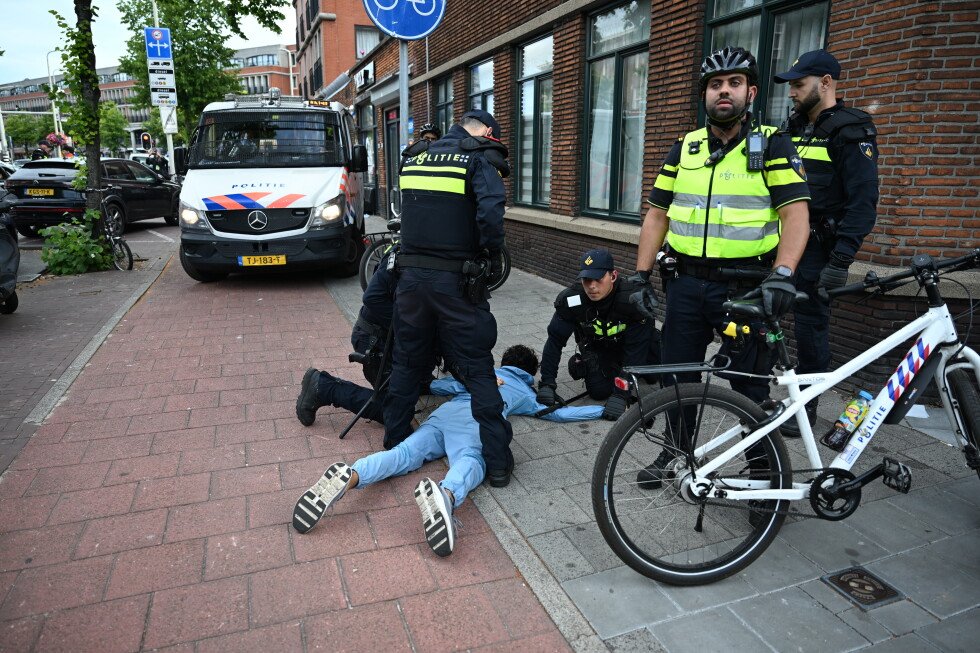soccer-fans-clash-with-police-in-the-hague-after-morocco-stuns-the-netherlands-at-the-world-cup