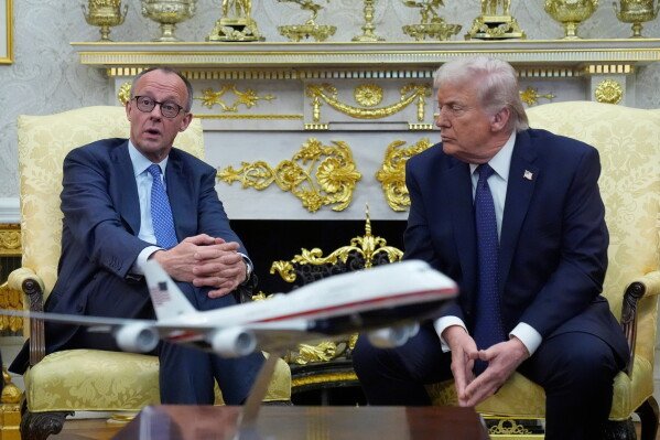 President Donald Trump meets with German Chancellor Friedrich Merz in the Oval Office at the White House, March 3, 2026, in Washington. (AP Photo/Mark Schiefelbein, File)