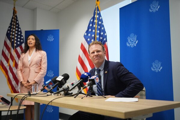 Andrew Giuliani, right, head of the White House FIFA World Cup task force, speaks at a news briefing about World Cup security, Thursday, June 4, 2026, in Miami. (AP Photo/Rebecca Blackwell)