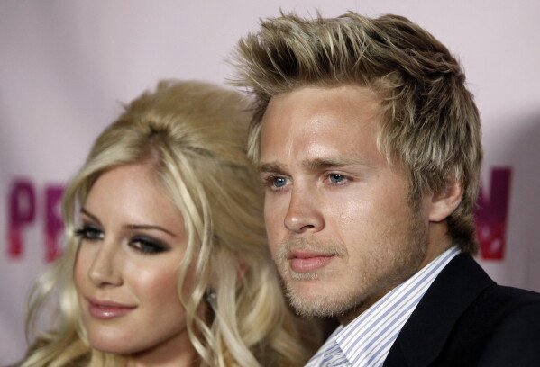 Spencer Pratt, right, and Heidi Montag are seen in West Hollywood, Calif., March 28, 2009. (AP Photo/Matt Sayles, File)