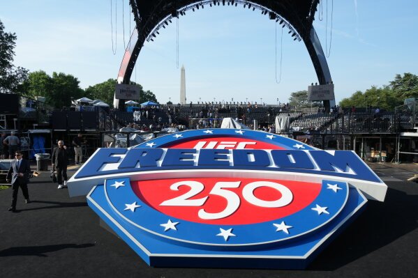 Members of the media tour the arena for the UFC Freedom 250 fights on the South Lawn of the White House, Thursday, June 11, 2026, in Washington. (AP Photo/Alex Brandon)