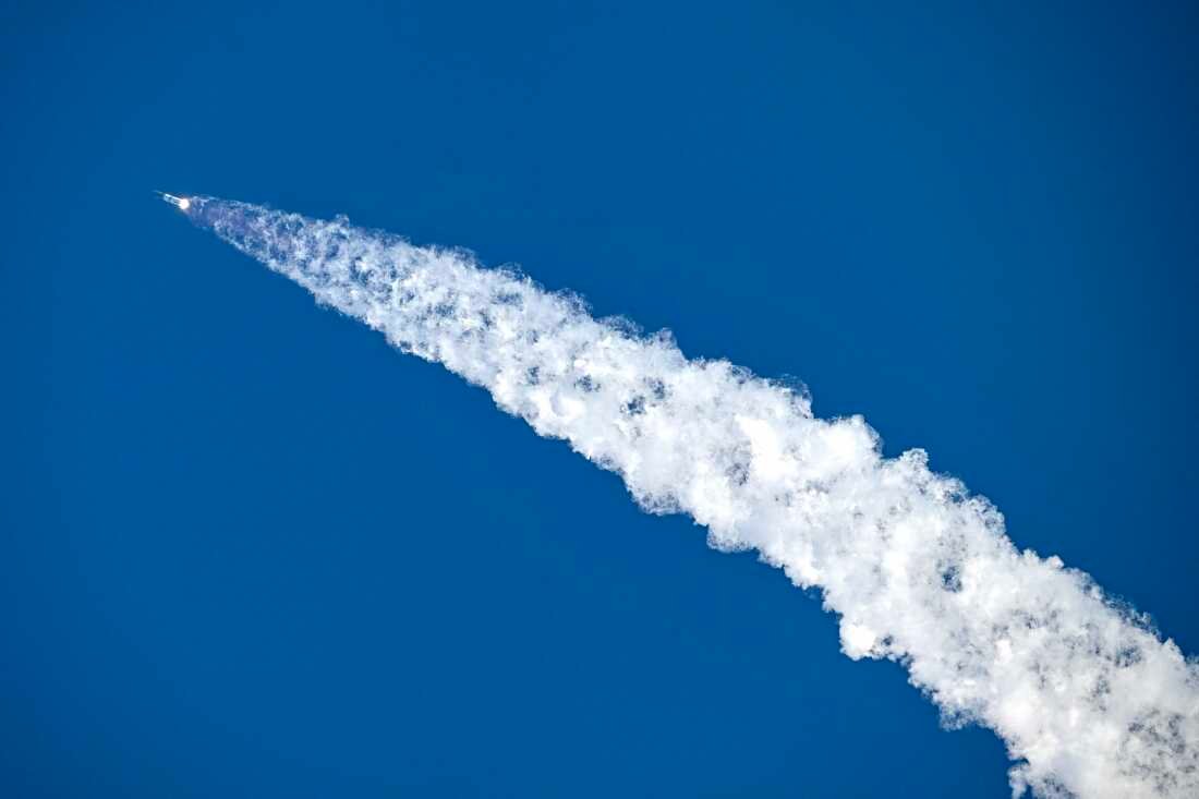 SpaceX's Starship 39 rocket launches from Starbase during the 12th test flight as seen from South Padre Island, Texas, on May 22, 2026.