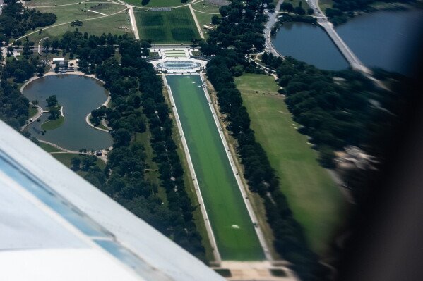 The Reflecting Pool and World War II Memorial are seen from the air, Tuesday, June 16, 2026, in Washington. (AP Photo/Alex Brandon)