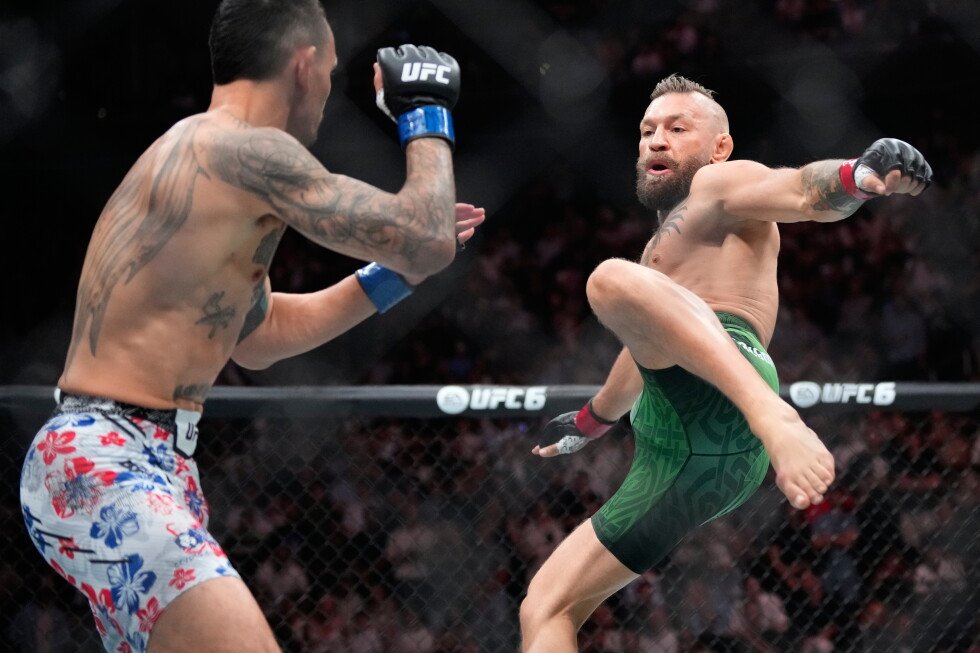 conor-mcgregor-suffers-early-knee-injury-in-return,-loses-to-max-holloway-at-ufc-329