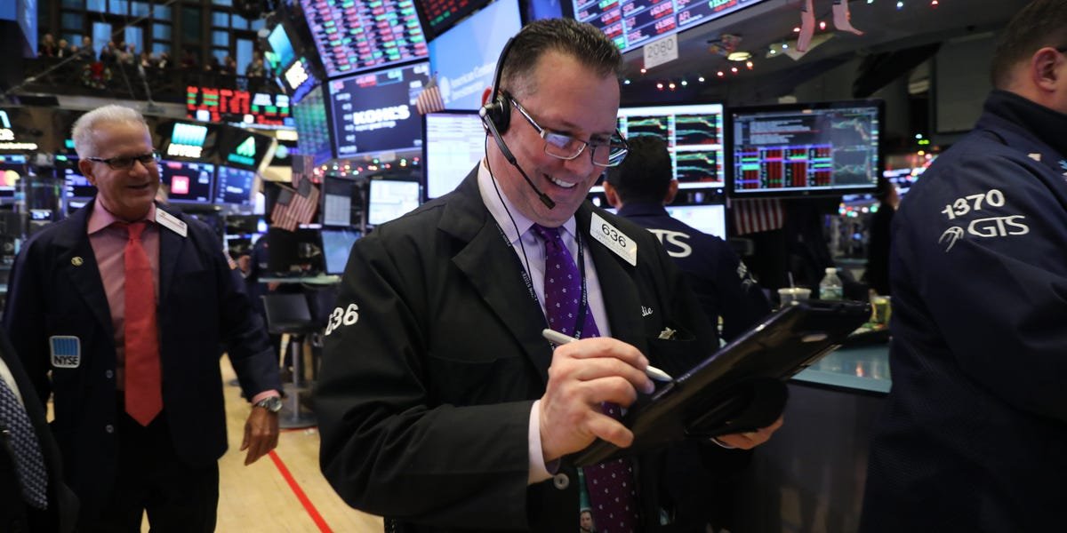 stock-market-today:-dow-surges-to-record-close-as-tech-rallies,-oil-falls