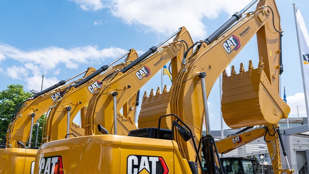 cat-stock-lifts-dow-jones-with-massive-earnings-beat
