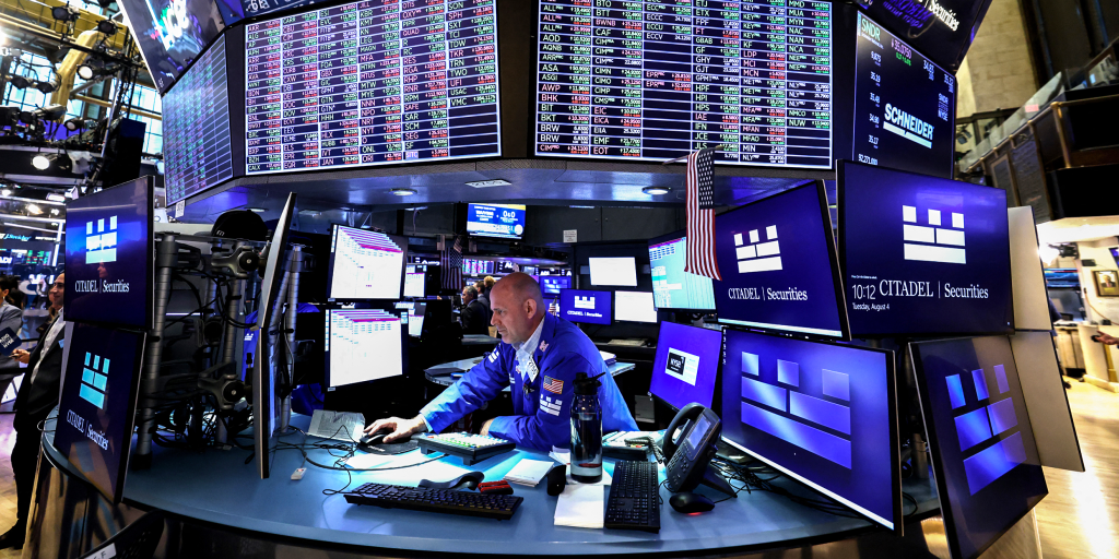 s&p-500,-dow-hit-new-highs-on-ai-linked-earnings,-iran-deal-hopes