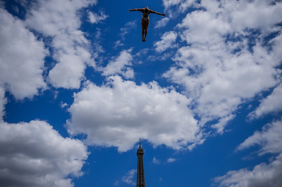 diving-into-the-blue-sky,-watched-by-the-eiffel-tower