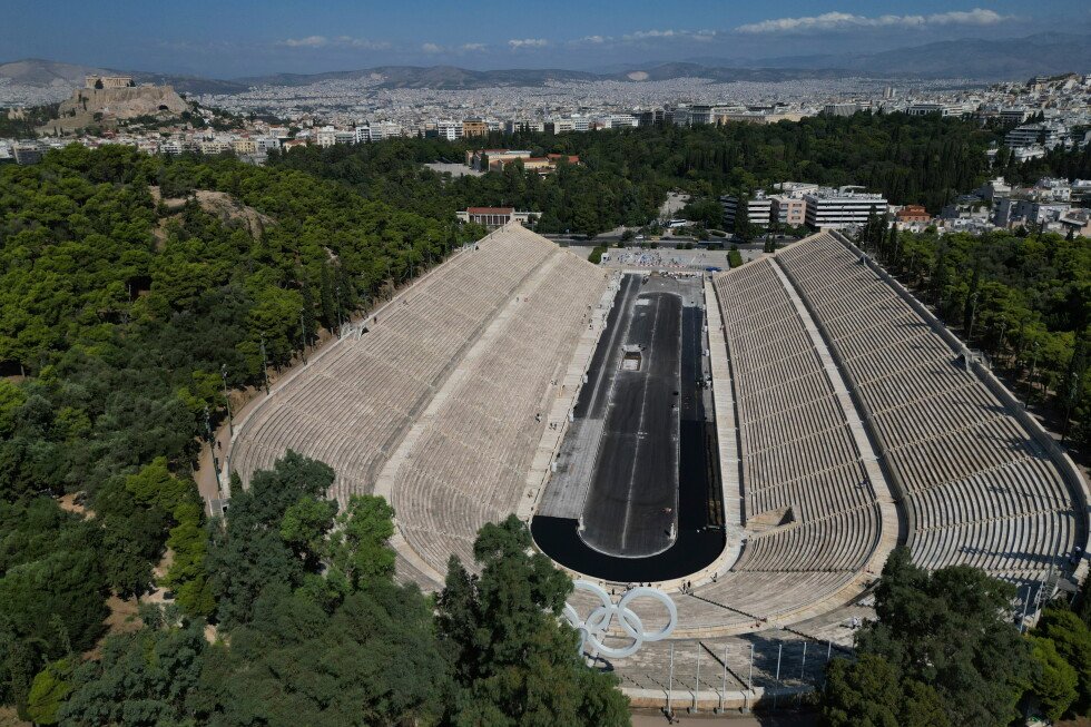 under-the-dirt,-a-gleaming-olympic-icon:-greece’s-marble-stadium-gets-a-deep-clean