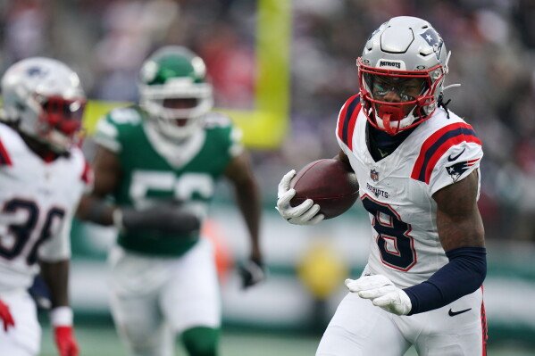 New England Patriots wide receiver Stefon Diggs (8) runs the ball down the field during an NFL football game against the New York Jets, Dec. 28, 2025 in New York. (AP Photo/Vera Nieuwenhuis, File)