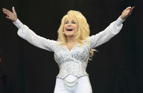 Dolly Parton poses at the Carnegie Medal of Philanthropy Ceremony in New York, on Oct. 13, 2022. (AP Photo/Andres Kudacki, File)