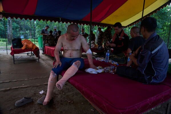 A survived Chinese citizen receive treatment at the army's Maithali barracks after being rescued from flash flooding in Nuwakot district, Nepal, Thursday, Aug. 27, 2026. (AP Photo/Niranjan Shrestha)