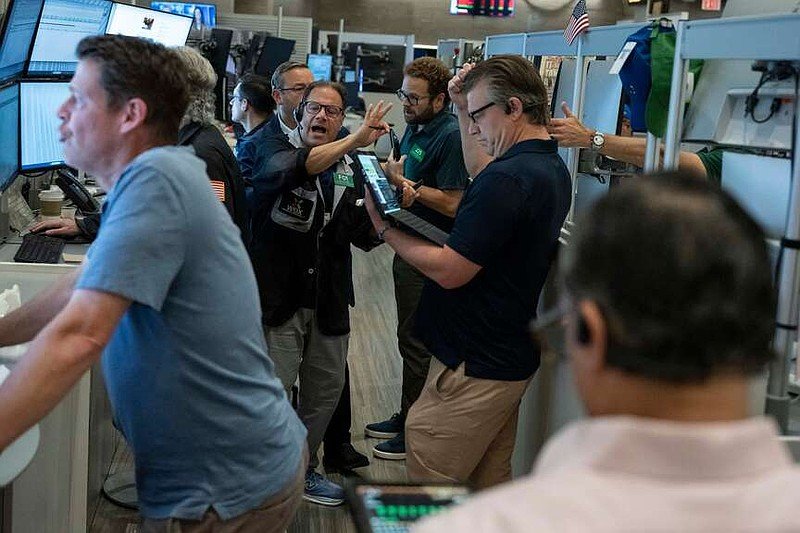 Options trader Anthony Spina works on the floor of the New York Stock Exchange, Thursday, Aug. 27, 2026, in New York. (AP Photo/Yuki Iwamura)