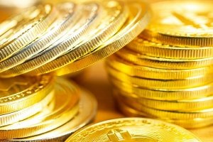 Gold hits record, stocks slip as Trump fuels Fed fears