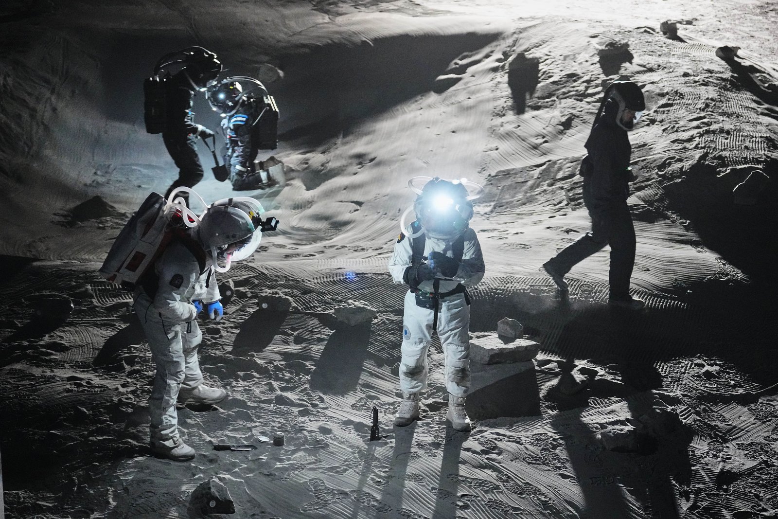 Scientists test newly developed spacesuits at the LUNA analog facility in preparation of future human and robotic missions to the moon, simulating the lunar surface for astronauts and robotic systems for the European Space Agency at the German Aerospace Center near Cologne, Germany, Thursday, Sept. 3, 2026. (AP Photo/Martin Meissner)