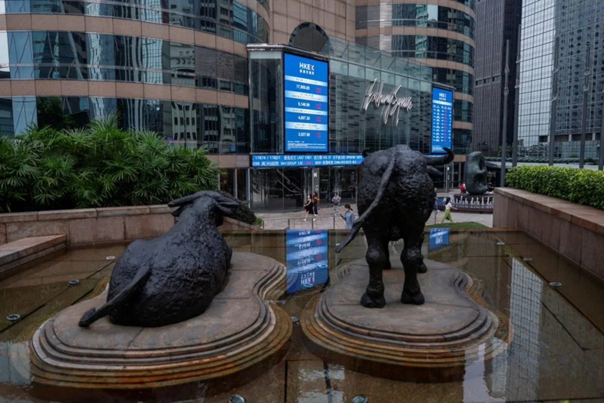 asian-stocks-skid,-wall-street-and-bonds-aided-by-oil-slip