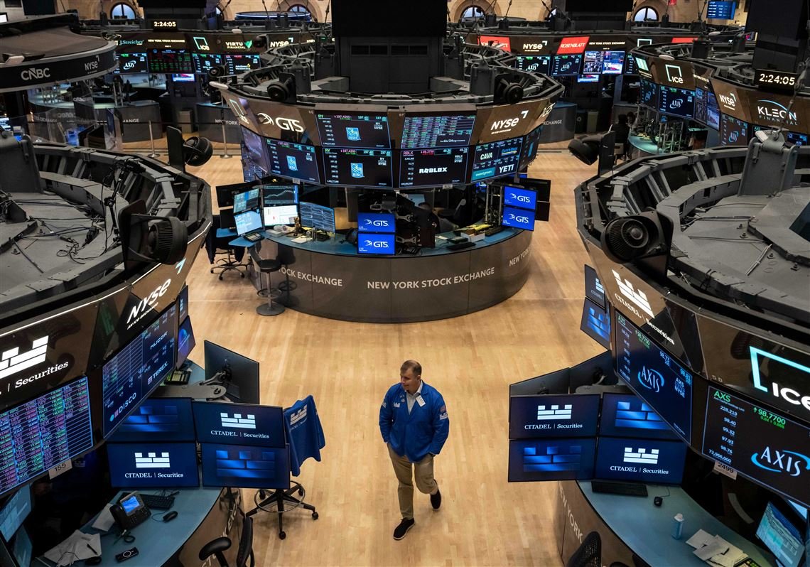 wall-street-is-mixed-as-more-drops-for-ai-stocks-offset-some-strong-profit-reports