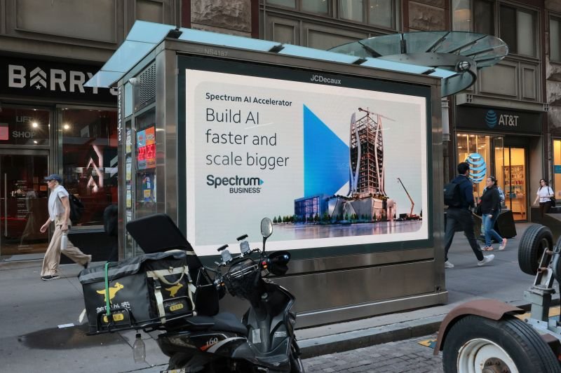 An AI advertisement is displayed near the New York Stock Exchange on September 14, 2026, in New York.