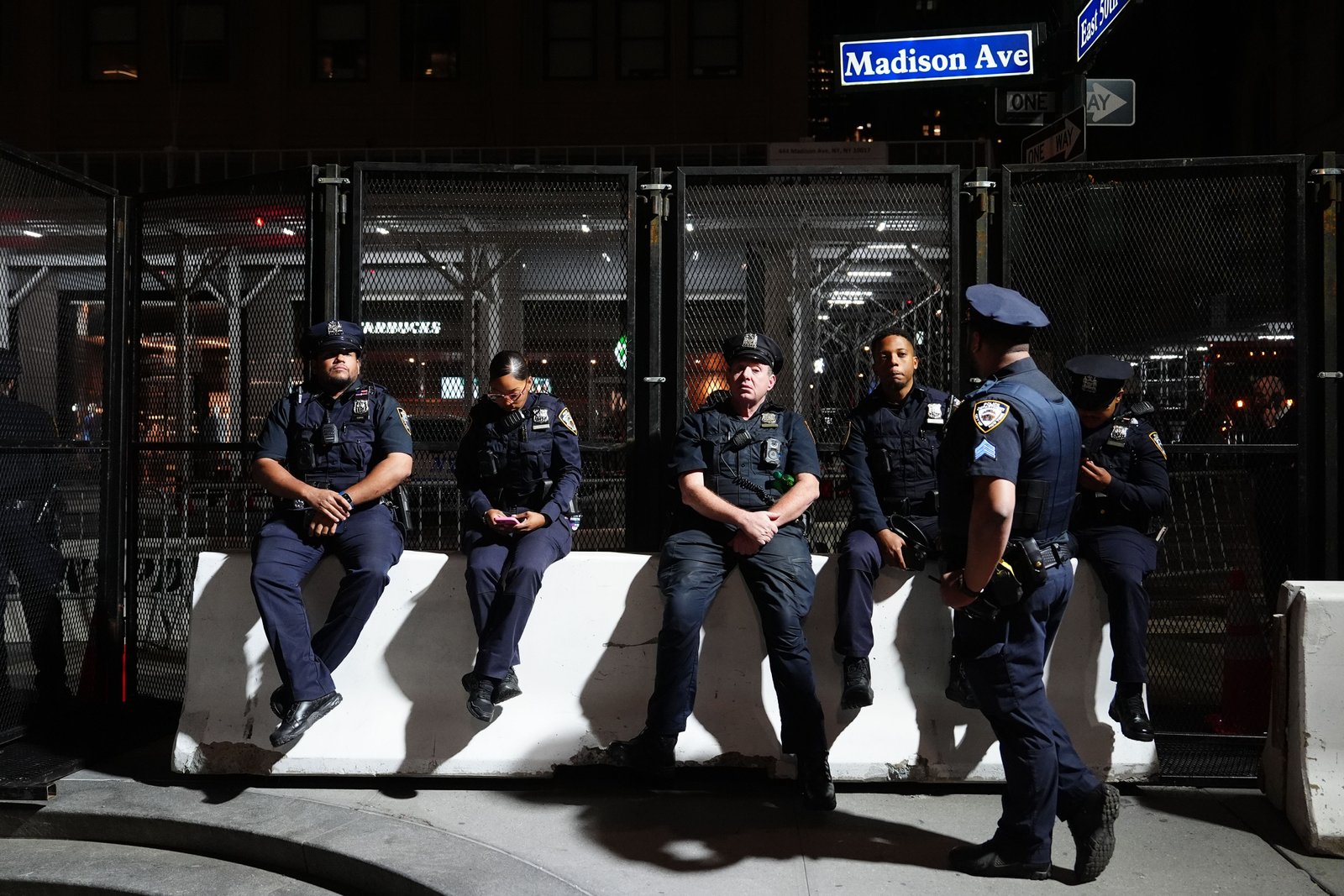 New York City police officers are on duty outside the Lotte Palace Hotel during a United Nations General Assembly leaders reception, late Tuesday, Sept. 22, 2026, in New York. (AP Photo/Julia Demaree Nikhinson)